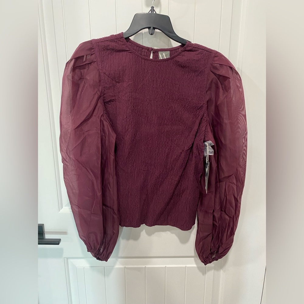 Womens stylish blouse with puffy sleeves